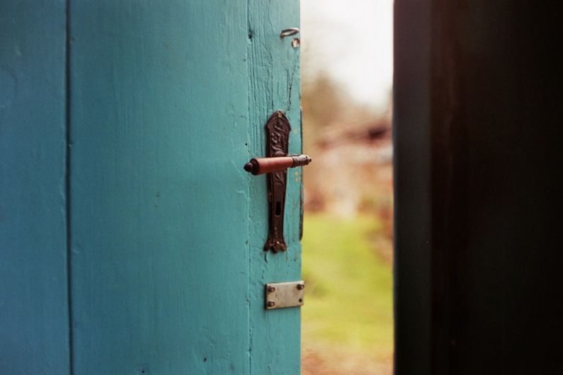Expectations - blue wooden door