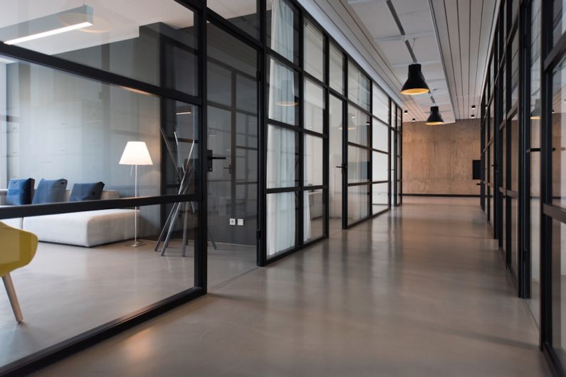 Commercial Real Estate - hallway between glass-panel doors