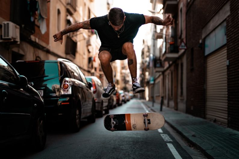 House Flipping - timelapse photography of man riding skateboard