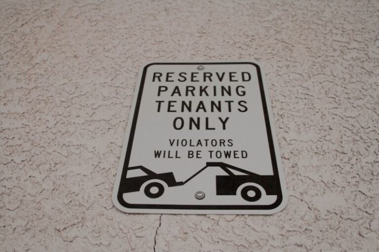 Problematic Tenants - reserved parking tenants only signage